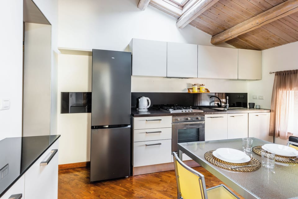 Condo | Private kitchen | Electric kettle, dining table