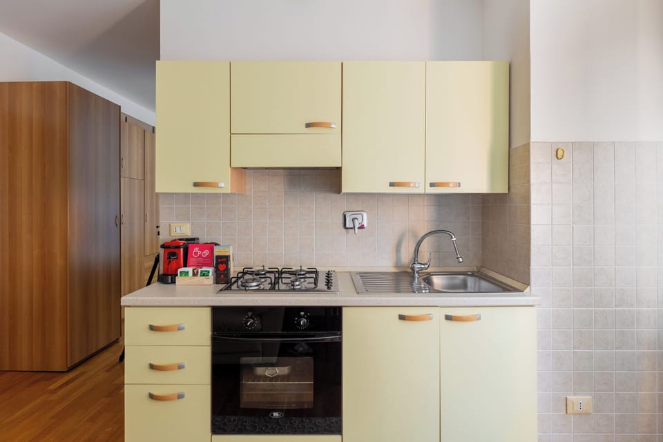 Condo | Private kitchen | Espresso maker, electric kettle