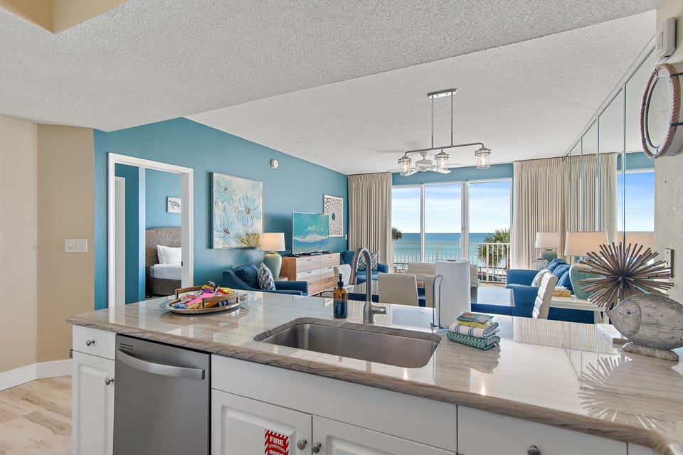 Kitchen has GULF VIEWS, granite countertops, stainless appliances - fully stocked with more than the basics (coffee/tea bar, oils/salt and pepper, Tupperware, plenty of pots/pans/cookware)