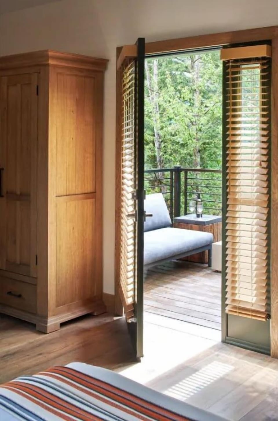 Private patio with serene forest views – perfect for enjoying your morning coffee.
