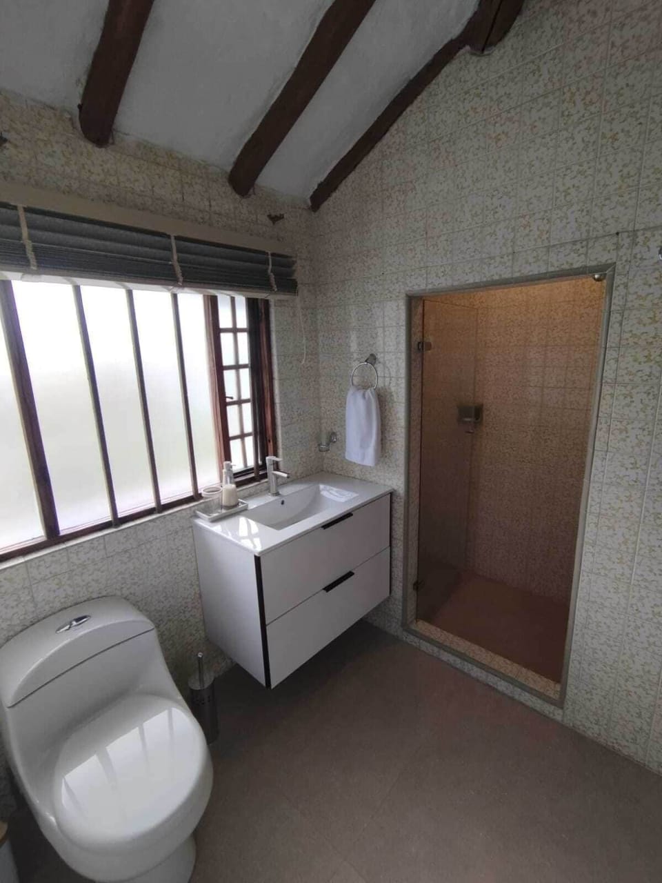 Shower, rainfall showerhead, towels