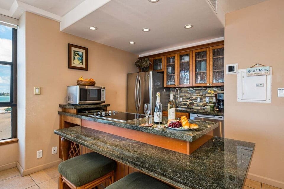 Kitchen counter with bar seating, perfect for quick breakfast