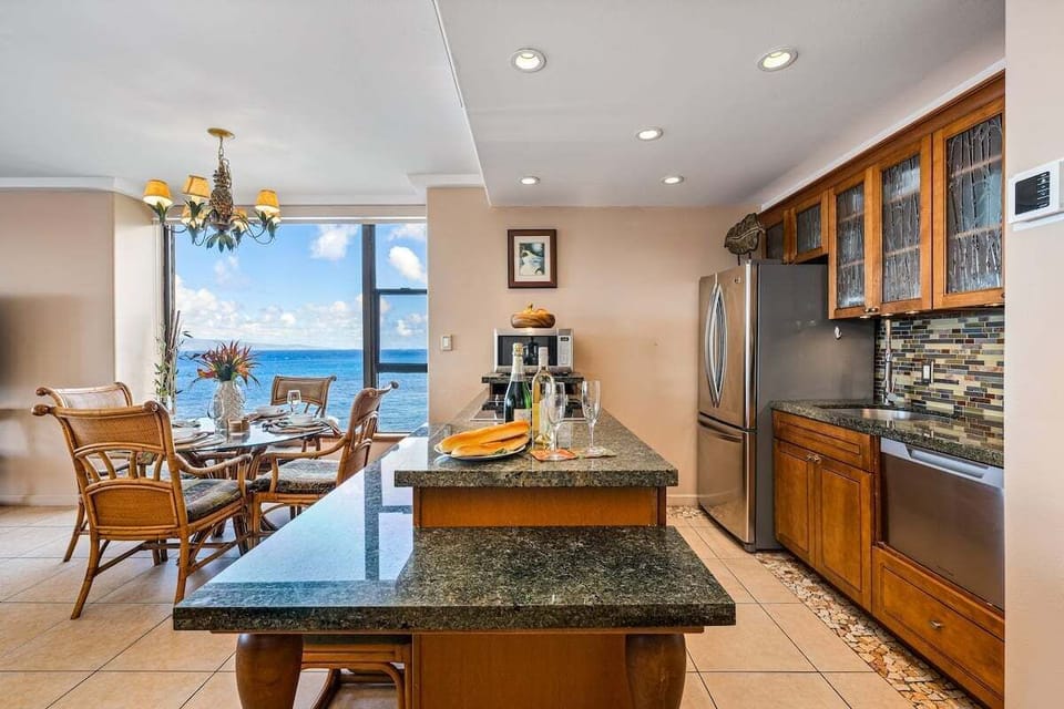 Bright and spacious fully equipped kitchen complete with stainless steel appliances