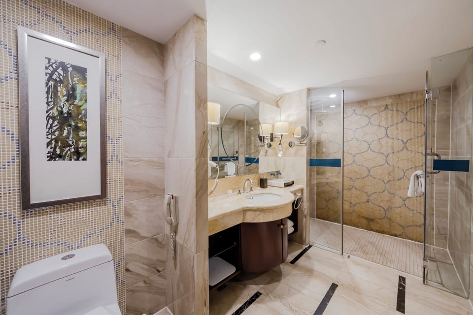 Panoramic Duplex, Canal View | Bathroom | Shower, rainfall showerhead, hair dryer, bathrobes