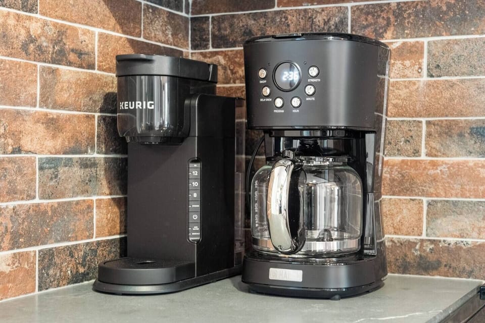 Multiple Coffee Options Available: This home features several coffee options, including a Keurig, a pour-over setup (bring your favourite ground coffee), and a Nespresso machine.