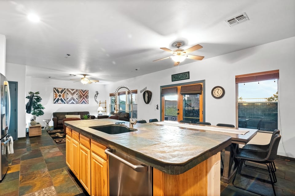 Open kitchen island overlooking living space—easy to socialize while prepping.