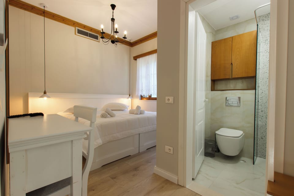 Economy Double Room | Minibar, desk, laptop workspace, soundproofing