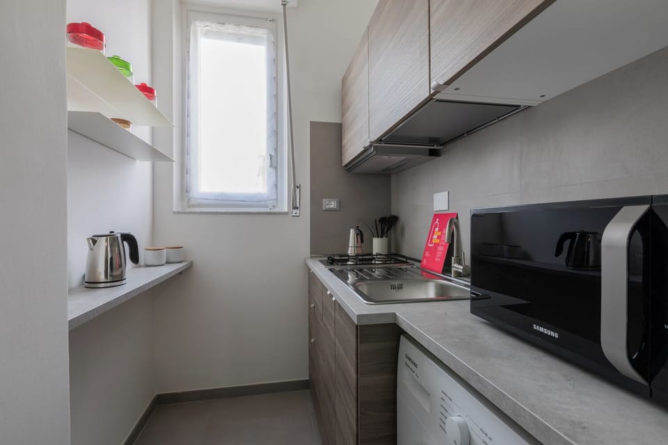 Apartment, Balcony | Private kitchen | Fridge, microwave, stovetop, espresso maker