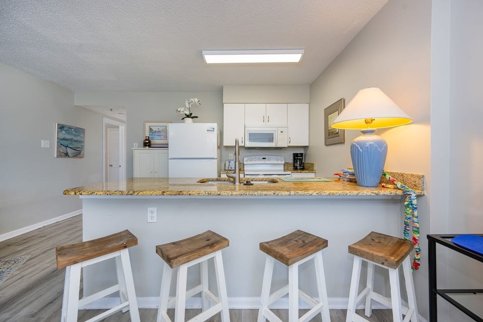 Condo, 2 Bedrooms | Private kitchen | Fridge, oven, coffee/tea maker