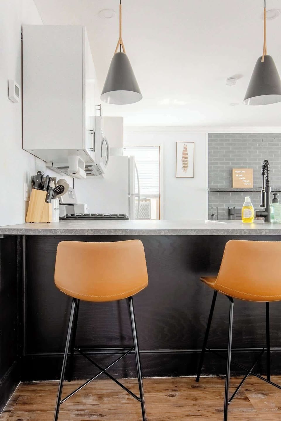 Seating for 3 at breakfast bar. 