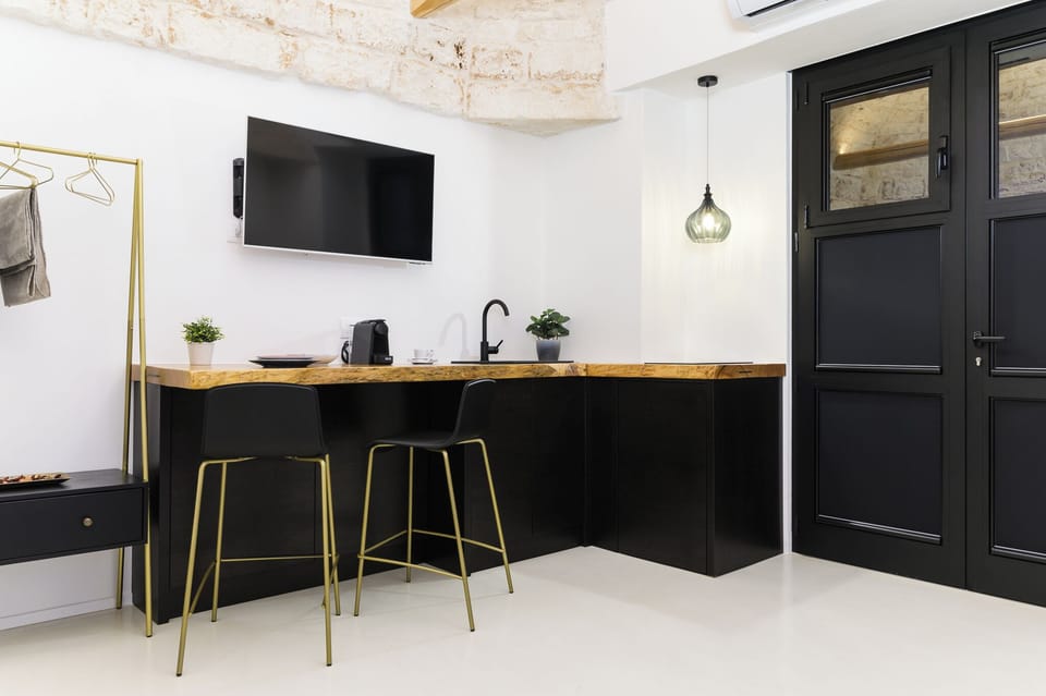 Apartment | Private kitchen | Fridge, stovetop, espresso maker, cookware/dishes/utensils