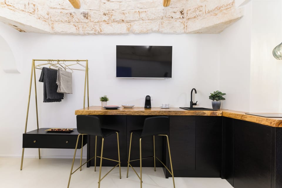 Apartment | Private kitchen | Fridge, stovetop, espresso maker, cookware/dishes/utensils
