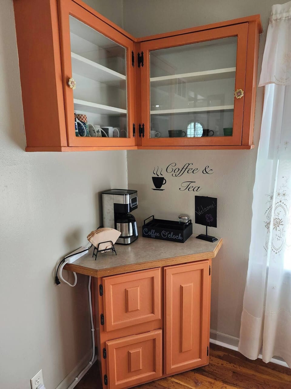 Coffee, tea, mugs provided in coffee nook.