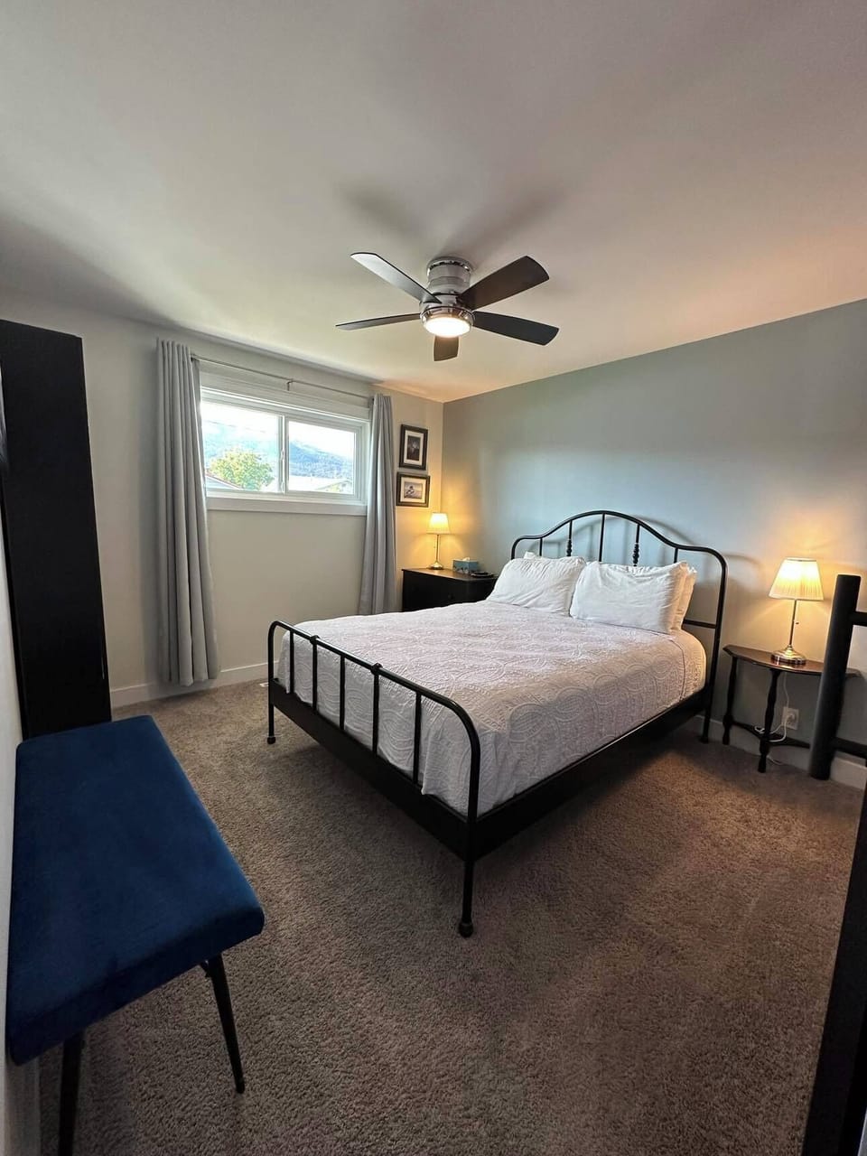 Second bedroom with west facing window and small dresser