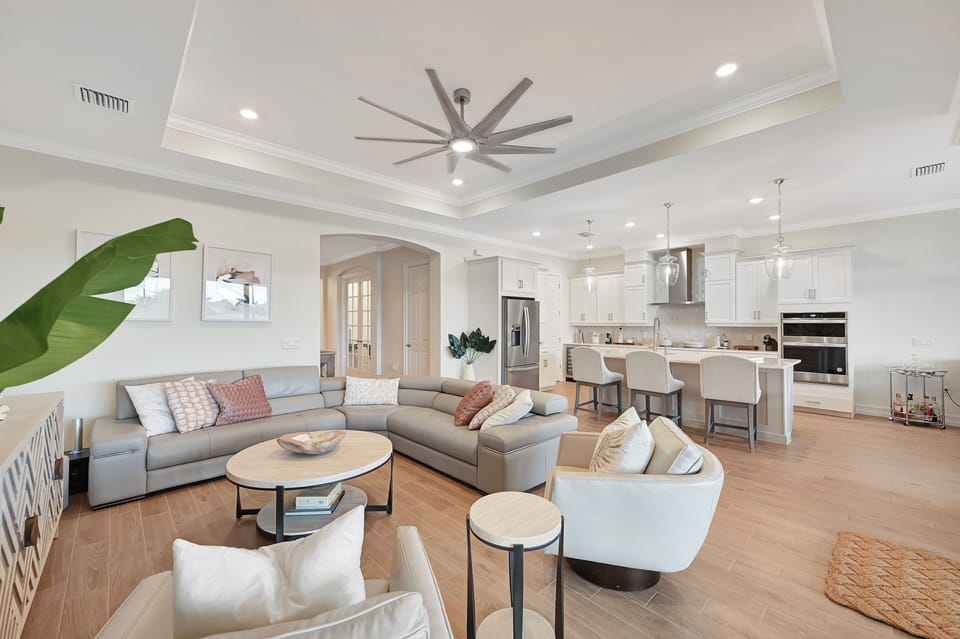 Open Concept Formal Living Room and Gourmet Kitchen Views.