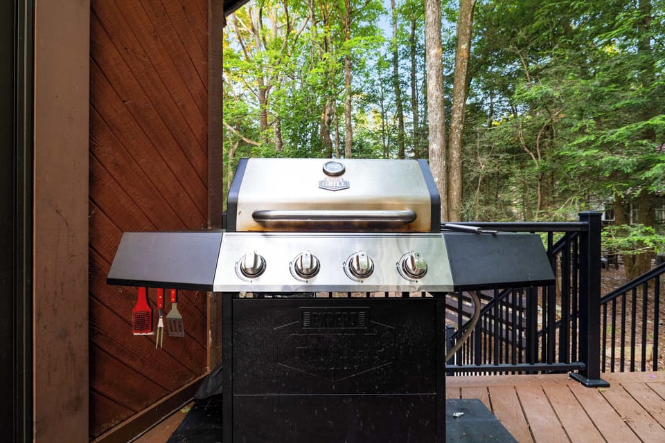 Get your grilling done on the four-burner stainless grill without ever leaving the deck.