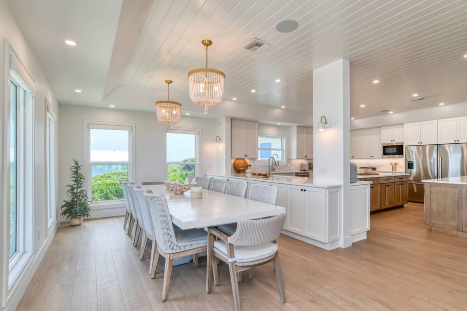 The expansive kitchen is stocked with every specialty appliance imaginable, making it the perfect place to prepare your favorite foods and drinks.