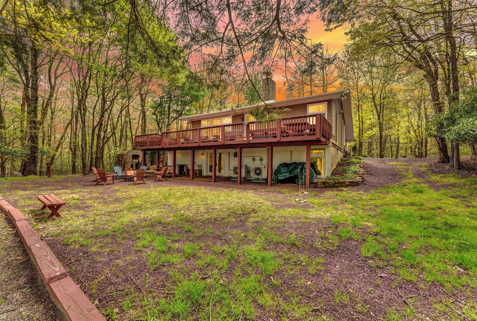 Enjoy serene outdoor gatherings and lush woodland views from your private deck!