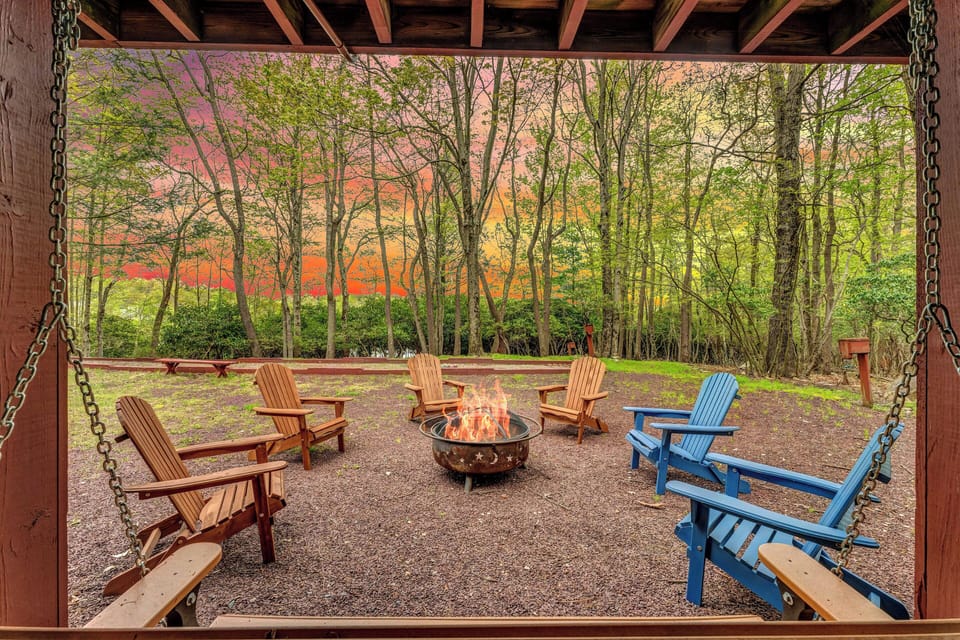 Outdoor Fire Pit: Gather around for stories and s'mores with nature's vibrant backdrop!