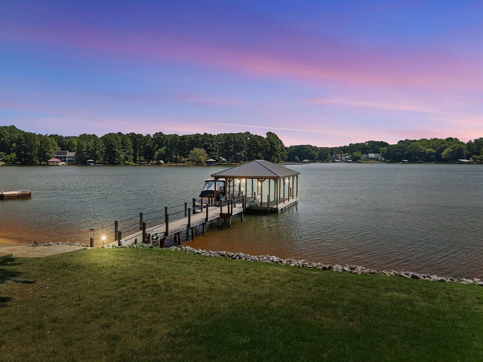 Covered dock to park your rented boar or  jump in the lake.