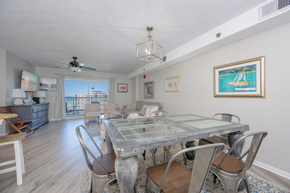 Vintage charm and coastal art fill the dining area where you gather for relaxed meals and laughter
