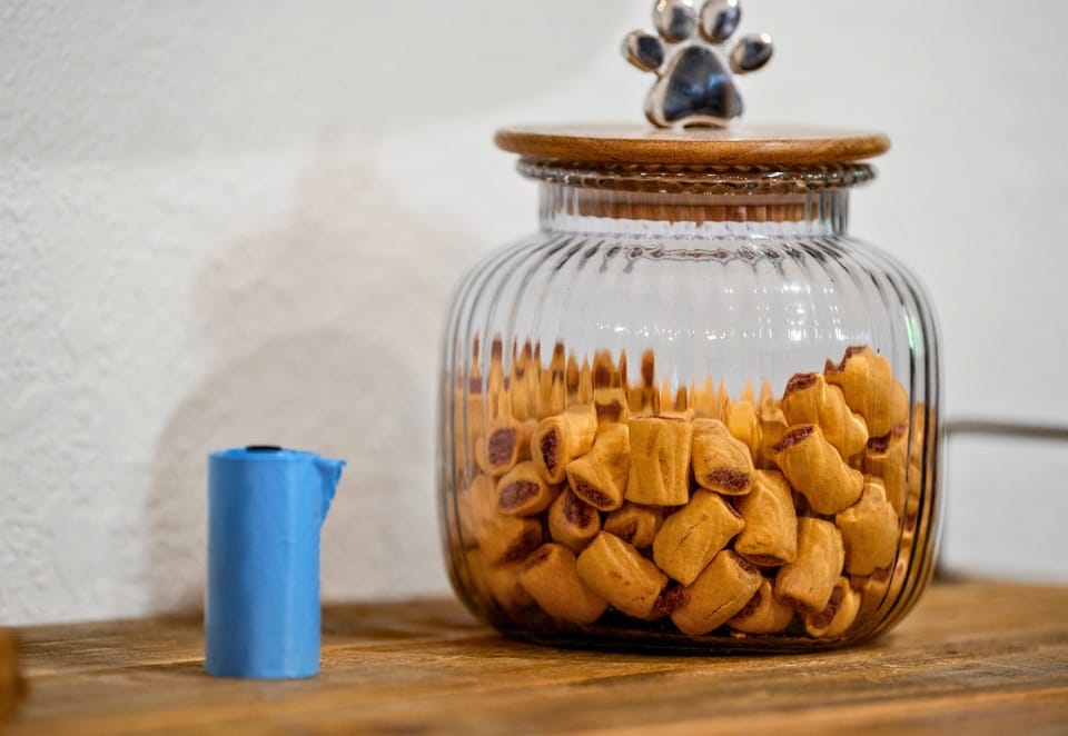 Spoil your pets with treats from our adorable treat jar, a small touch to make their stay enjoyable.