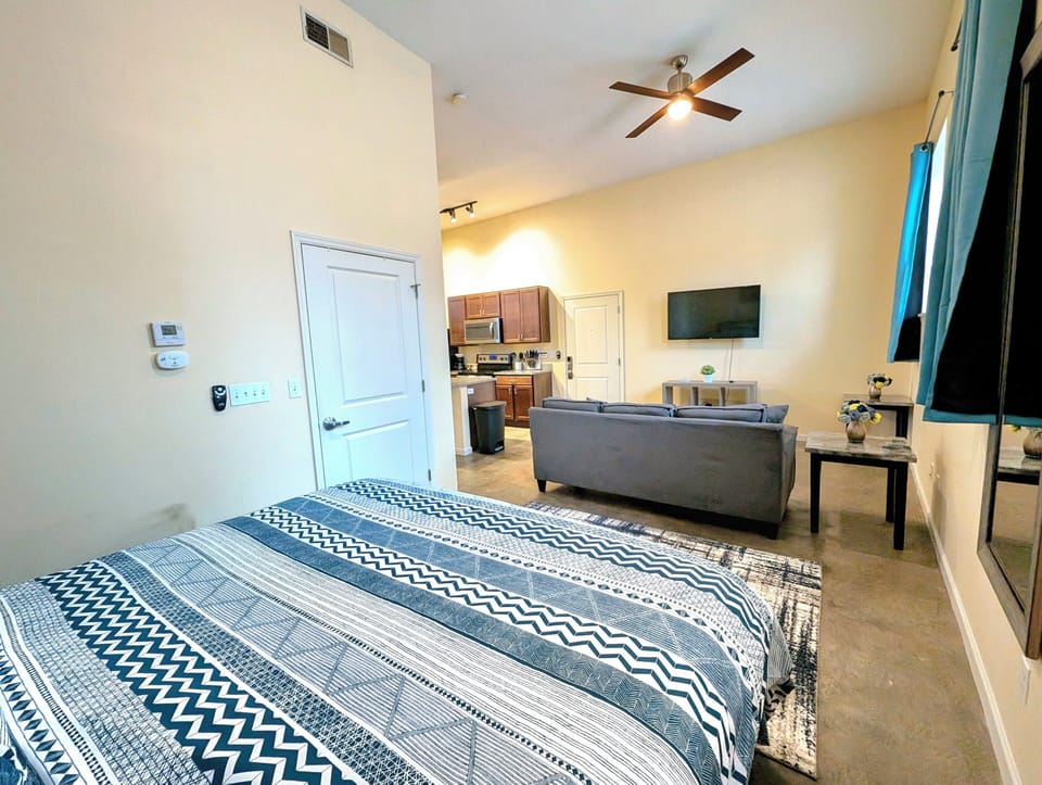 This king-sized bedroom offers the perfect retreat for relaxation and comfort.
