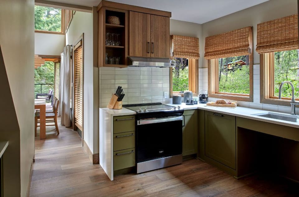 Fully equipped kitchen with modern appliances and scenic views, perfect for culinary adventures.
