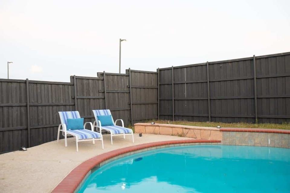 Salt water pool with loungers 