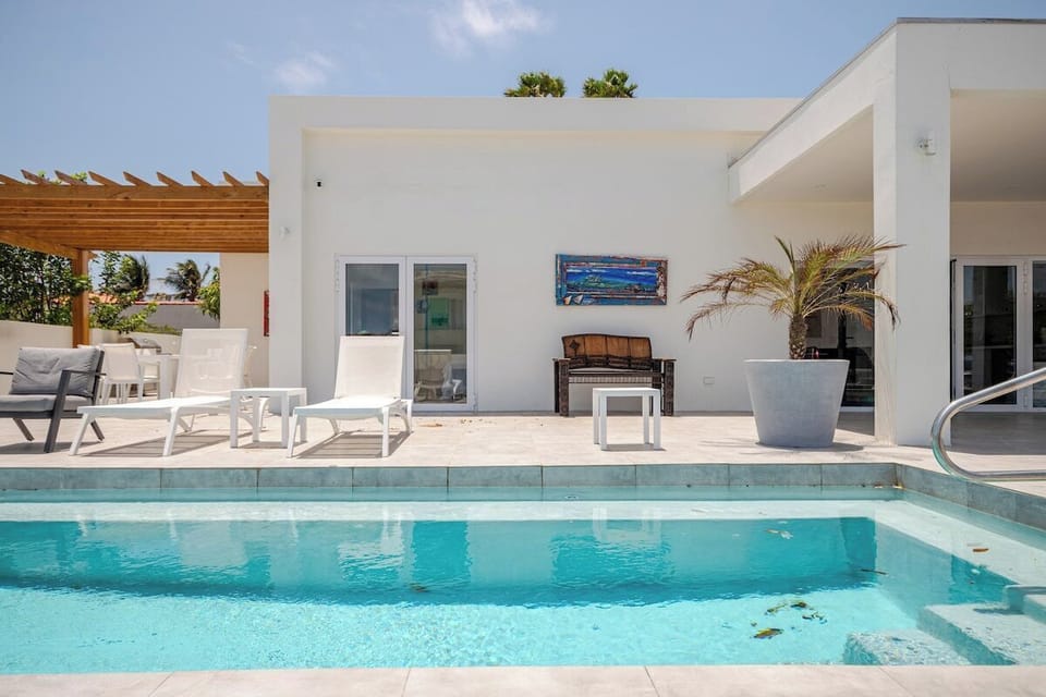 Relax and soak up the sun in our inviting poolside lounge chairs.