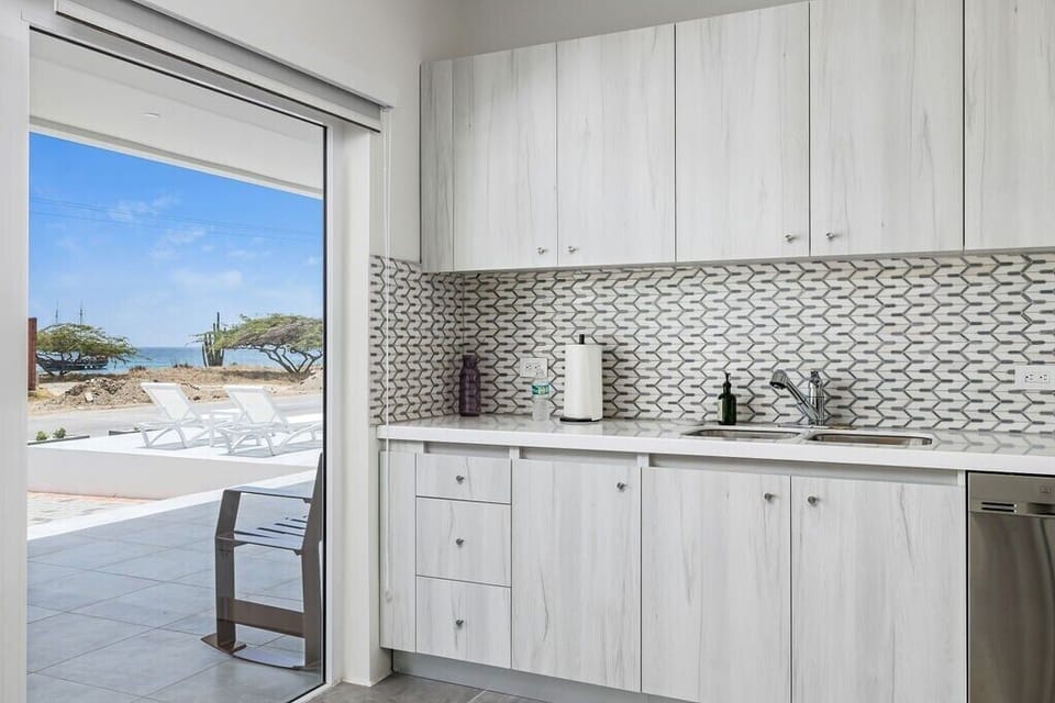 Kitchen
Fuel your stay with warmth and flavor in our welcoming kitchen. It's more than just a room; it's the heart of our home.