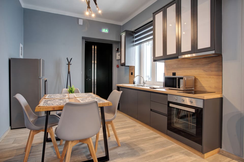 Superior Apartment 3 | Private kitchen | Full-size fridge, microwave, oven, stovetop