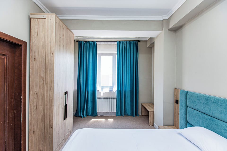 Standard Room, City View | 2 bedrooms, individually decorated, individually furnished, desk