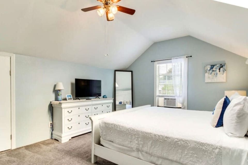 Upstairs king bed with smart tv.