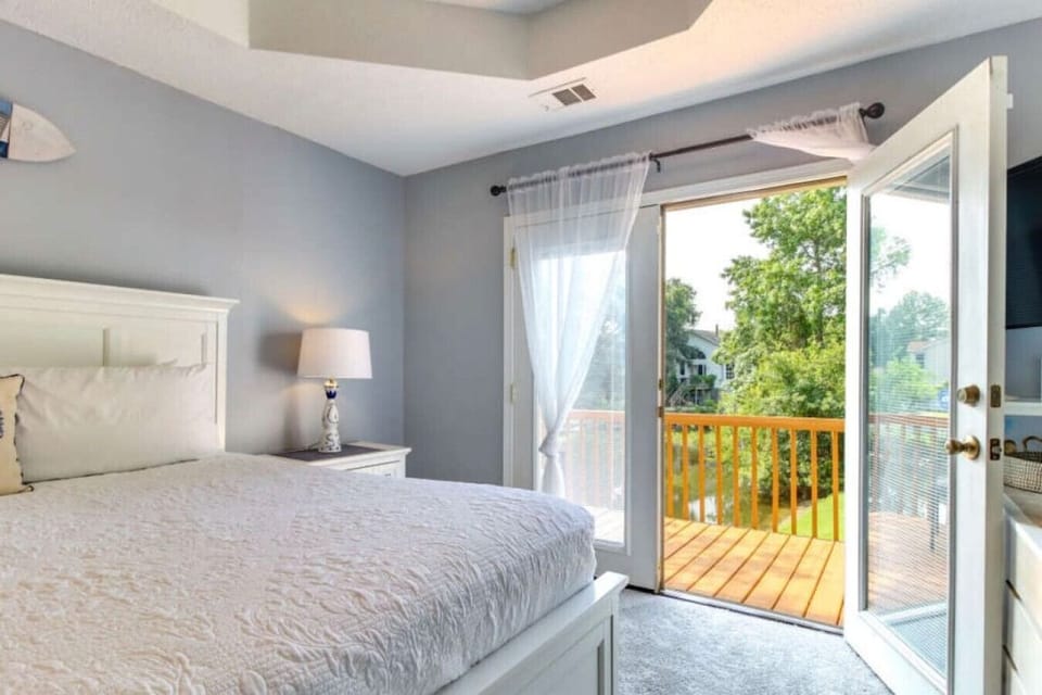 Bedroom # 1 is an elegant master bedroom with a king bed and exclusive access to a private porch.
