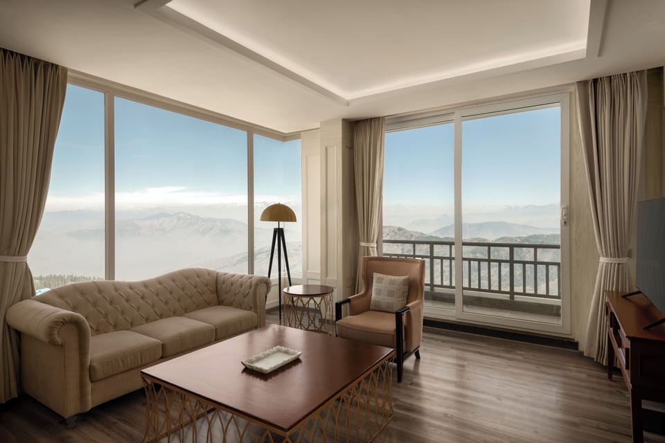 Signature Suite, 1 Bedroom, Mountain View, Corner | Living area | TV