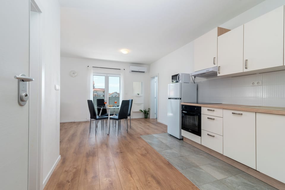 Luxury Apartment, Balcony, Sea View | Private kitchenette | Fridge, microwave, oven, stovetop