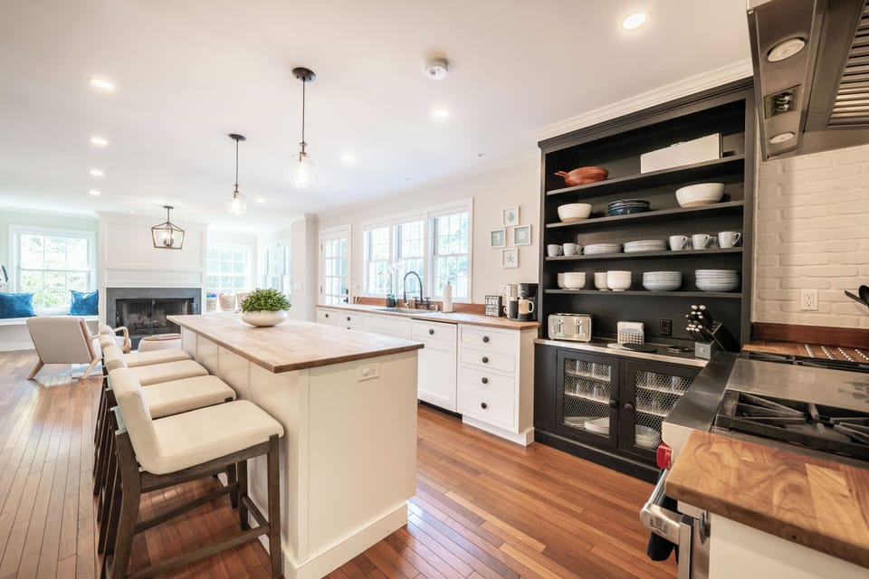 Chef's kitchen w/ bar seating , Bosch appliances & Wolf Double Oven