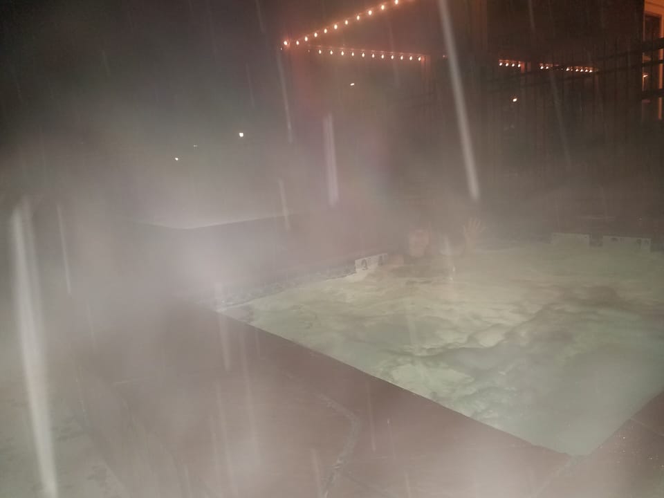 tubbing in the snowstorm, mountain-fresh