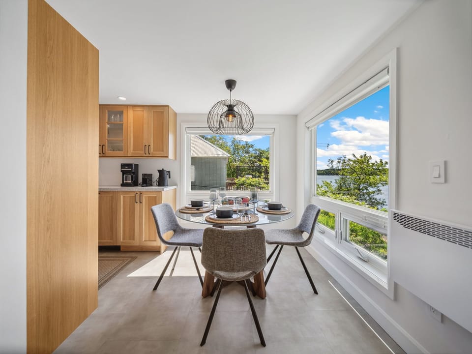 Dining/Kitchen Area: Hot water kettle, Coffee maker, and many more