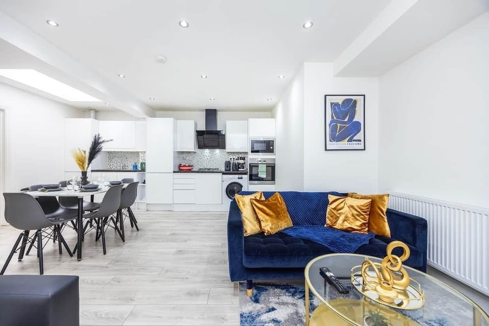 Our bright, open-plan layout ensures seamless access to the kitchen directly from the main living and dining areas. This modern, integrated space allows you to move easily between the lounge and the fully equipped cooking station.