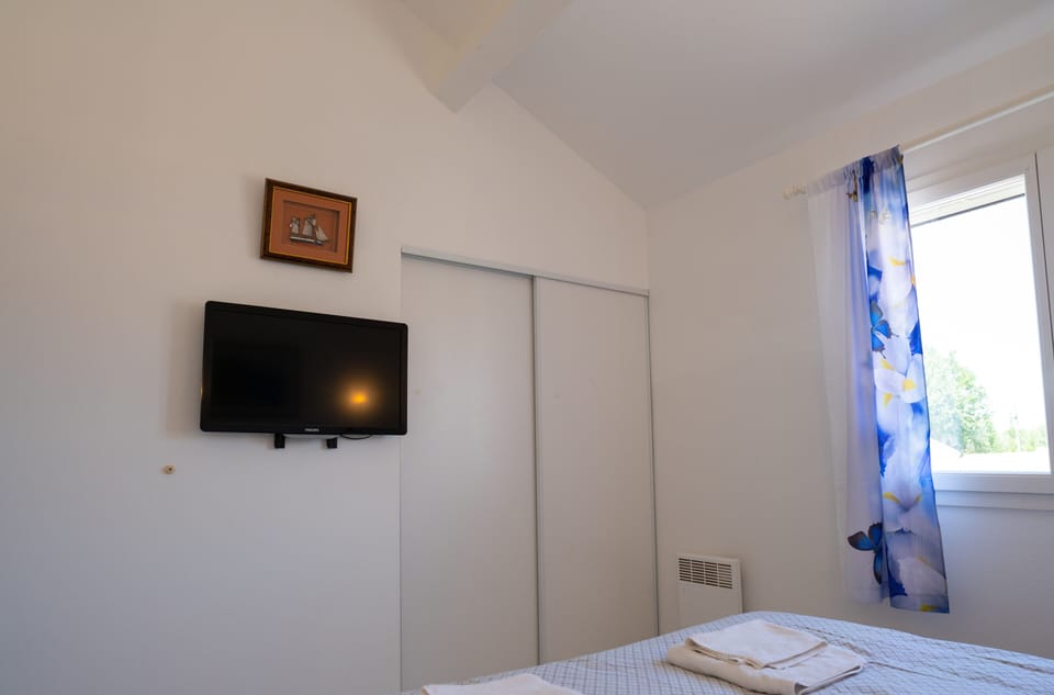 Double room upstairs with 180cm bed and TV