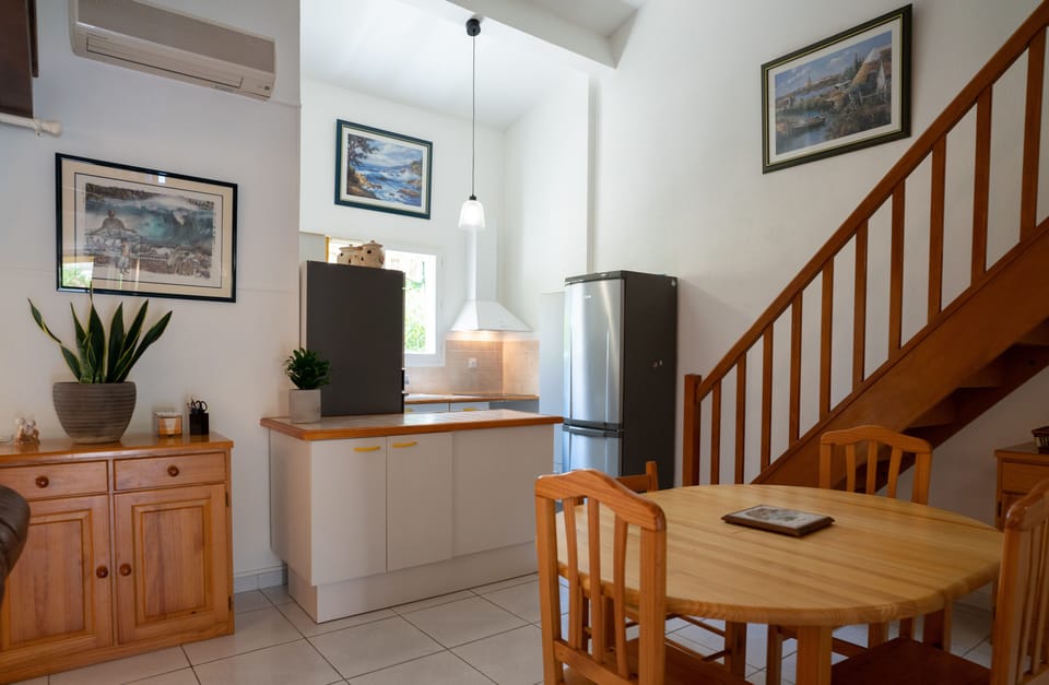 Fitted kitchen opening onto the living room