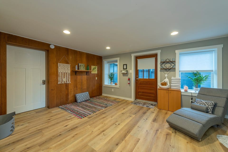 Bonus room with yoga space & outdoor patio access.