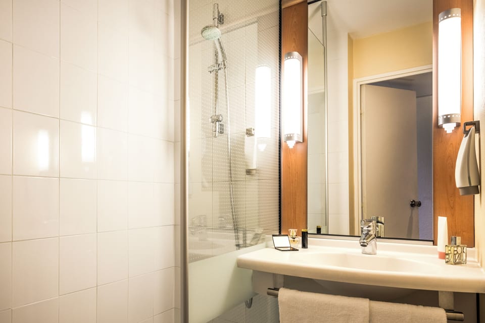 Standard Room, Multiple Beds | Bathroom | Shower, eco-friendly toiletries, hair dryer, towels
