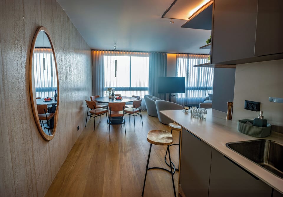 Luxury Apartment | Private kitchen | Full-size fridge, microwave, oven, stovetop