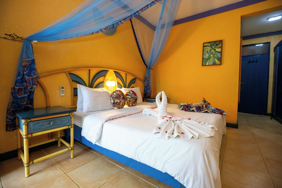 Deluxe Double Room Single Use, 1 Bedroom, Balcony, Partial Ocean View | Premium bedding, minibar, in-room safe, individually decorated