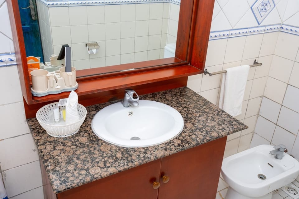 Deluxe Double Room Single Use, 1 Bedroom, Balcony, Partial Ocean View | Bathroom | Shower, hair dryer, towels, soap