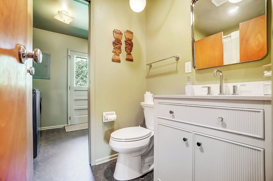 Full bathroom located in a central space for all guests to easily access. 