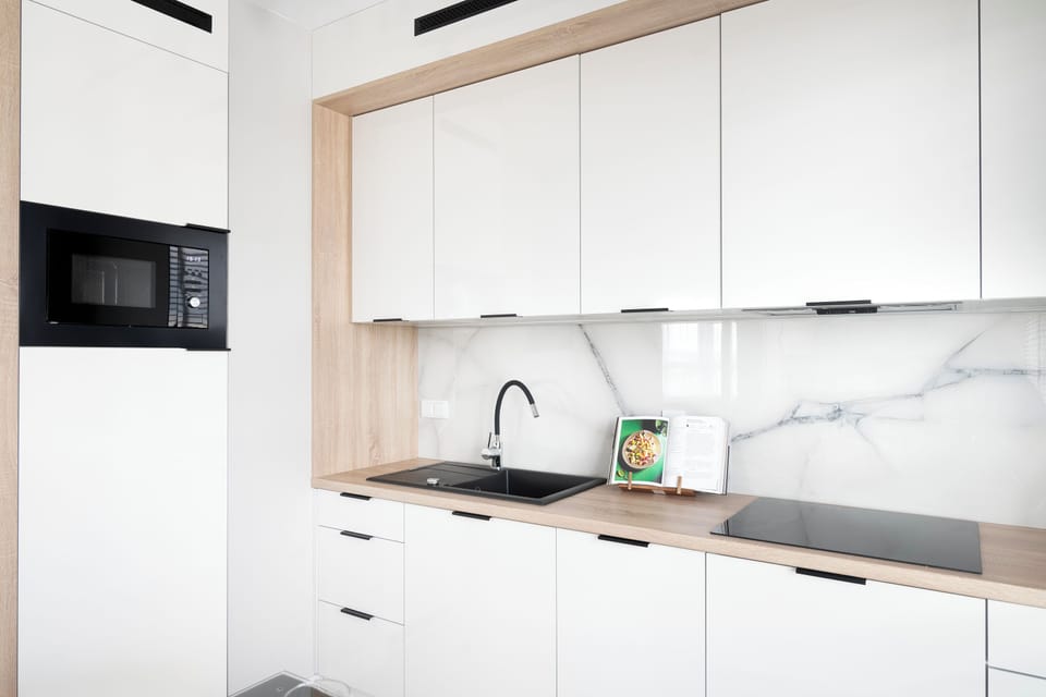 Luxury Apartment, 2 Bedrooms, Balcony, City View | Private kitchenette | Full-size fridge, microwave, stovetop, dishwasher